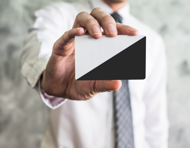 close-up-of-businessman-holding-white-blank-card-o-2025-02-21-10-52-59-utc.jpg.png