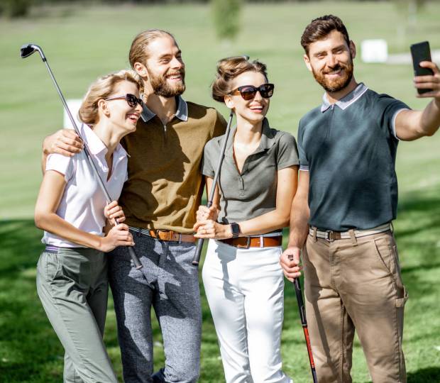 friends-making-selfie-photo-on-a-golf-course-2025-03-15-07-09-38-utc-scaled.jpg
